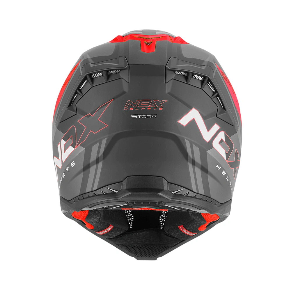 Vue arrière du casque motocross rouge et noir N634 Storm, ventilations et déco racing tout-terrain